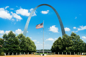 Gateway Arch with American Flag in front